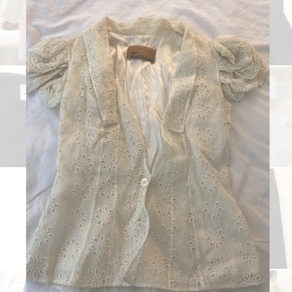 Vintage John Galliano white lace blouse with puff sleeves.